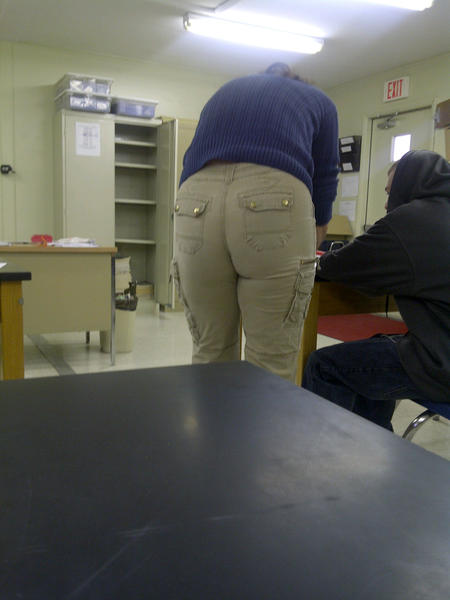 Teacher bending over
