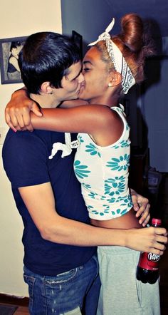 Interracial couples kissing and hugging