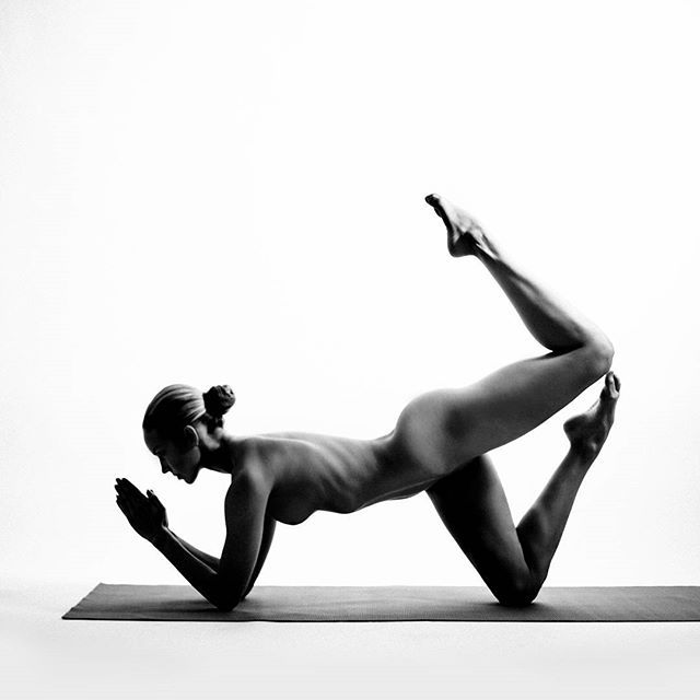 Nude yoga bow pose