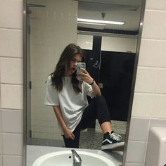 Amateur girl in bathroom stall