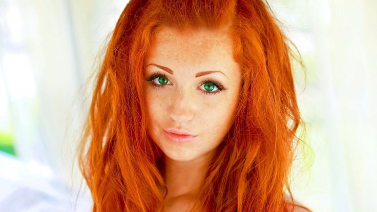 Redhead girl with green eyes