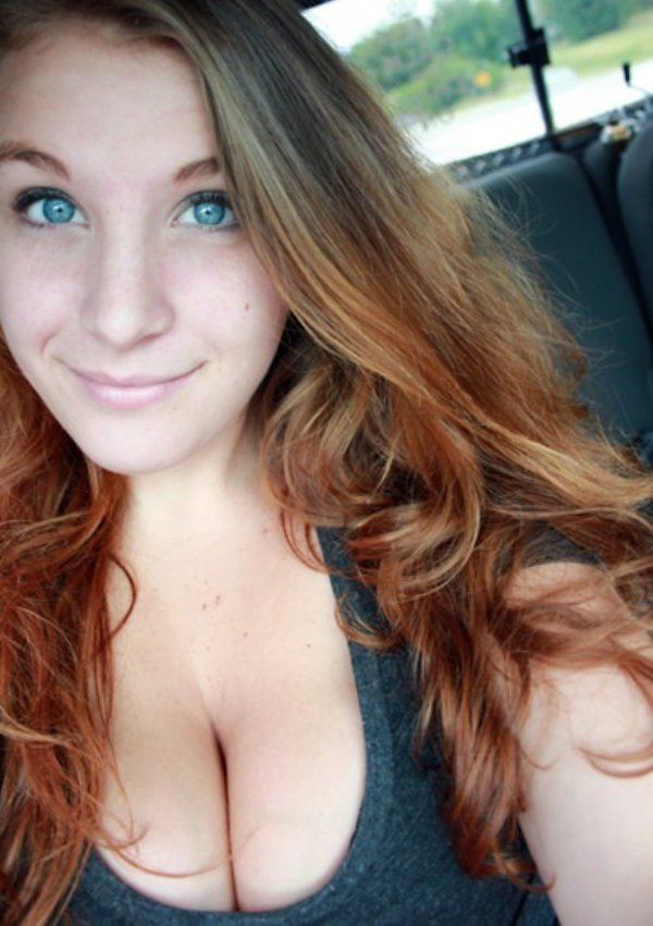 Busty pale redhead tits