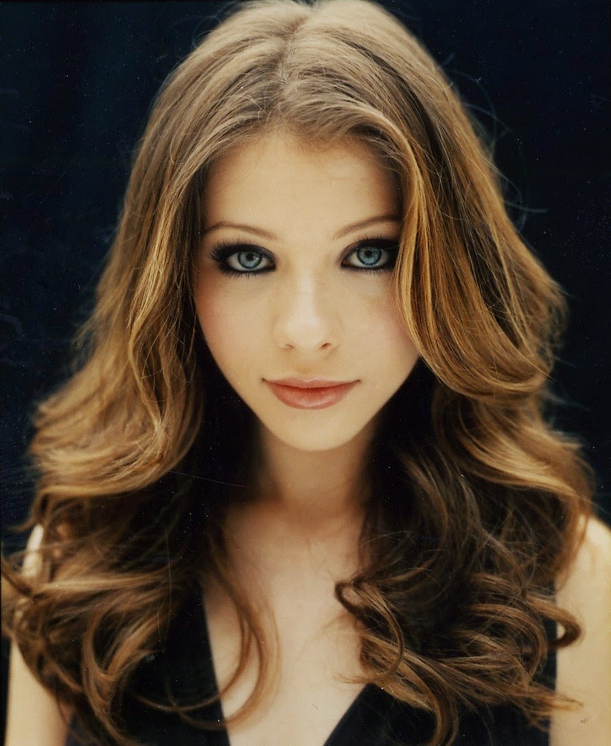 Girl with brown hair and blue eyes