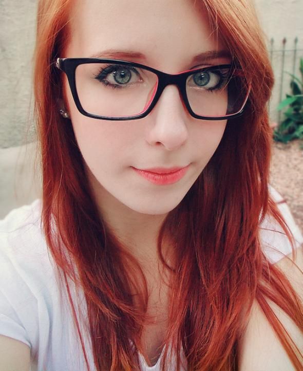 Cute redhead wearing glasses